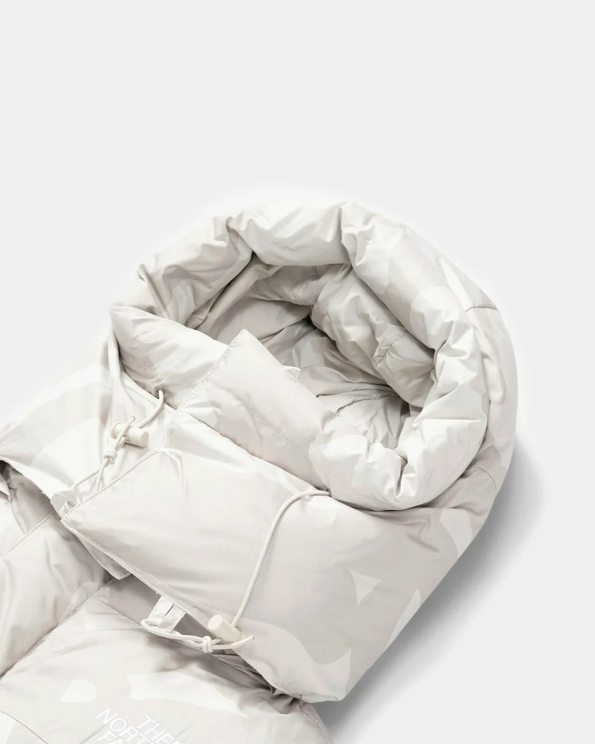 The North Face TNF X KAWS Retro 1994 Himalayan Parka (Moon Ivory) 2 The North Face TNF X KAWS Retro 1994 Himalayan Parka (Moon Ivory) - Image 2